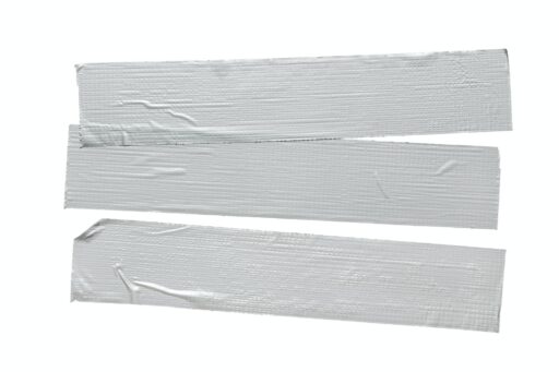 Set of three Silver grey repair duct tape pieces isolated on white background